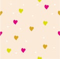 Seamless pattern with gold, red and yellow hearts on a beige background. Royalty Free Stock Photo